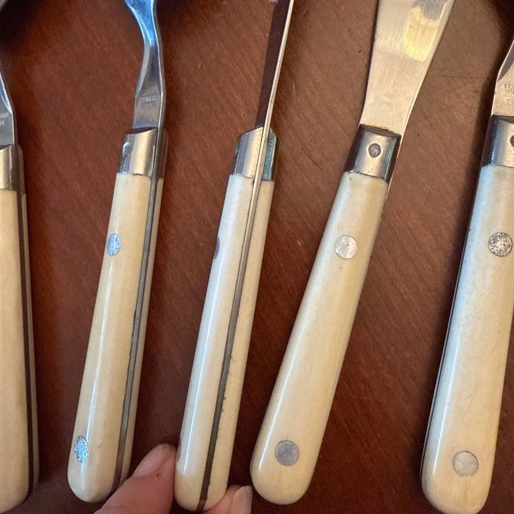 Mardi‎ Gras Korea Stainless silverware 2 sets w 4 pieces ea ivory midcentury vtg
